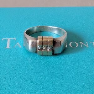 Elegant Silver and Gold Ring with Diamonds